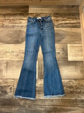 KanCan Mid Blue Flare Jeans with Raw Hem
